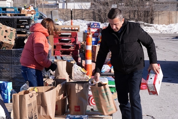 Ken Martin delivering supplies to families in need